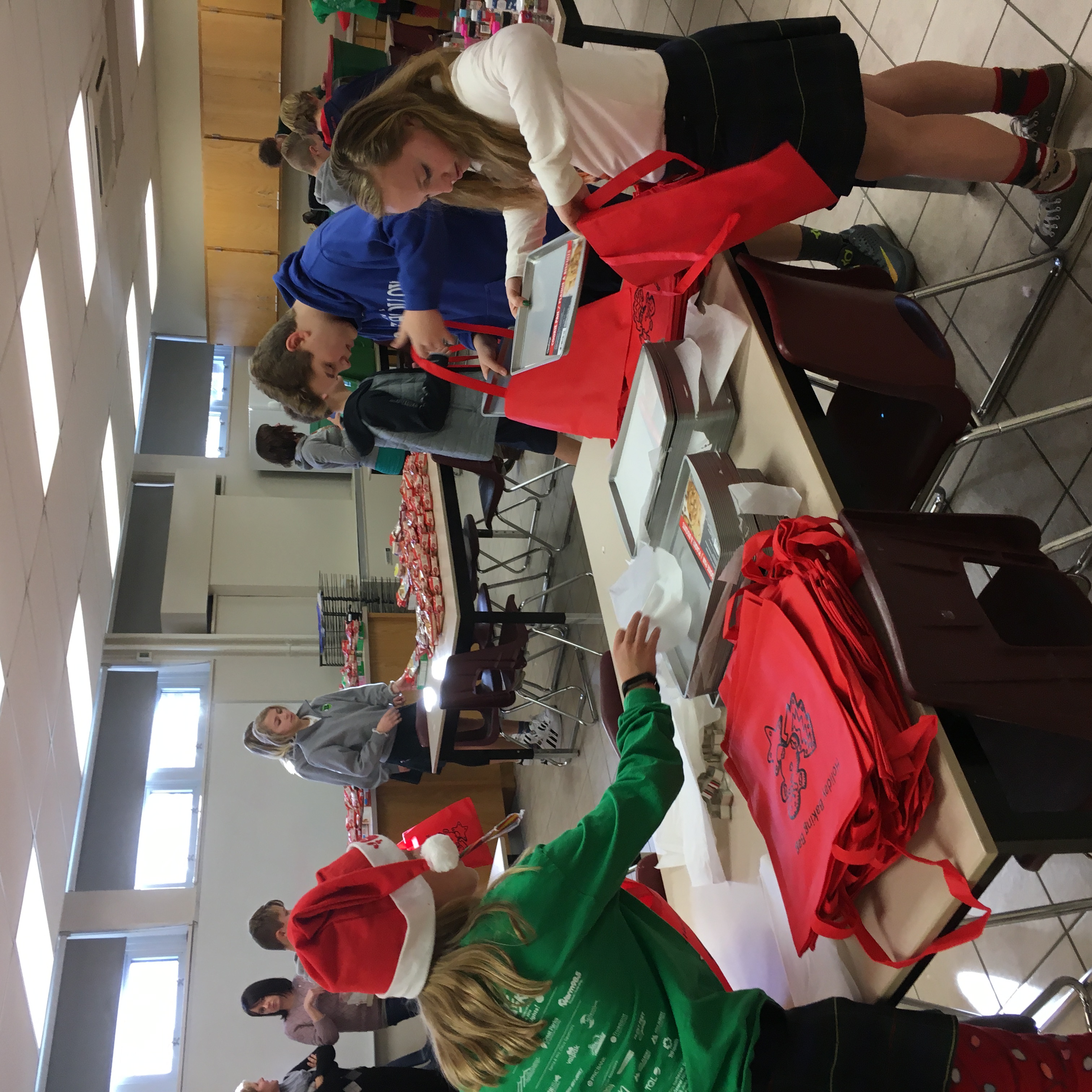 Volunteers packing Holiday Baking Bags at a community event