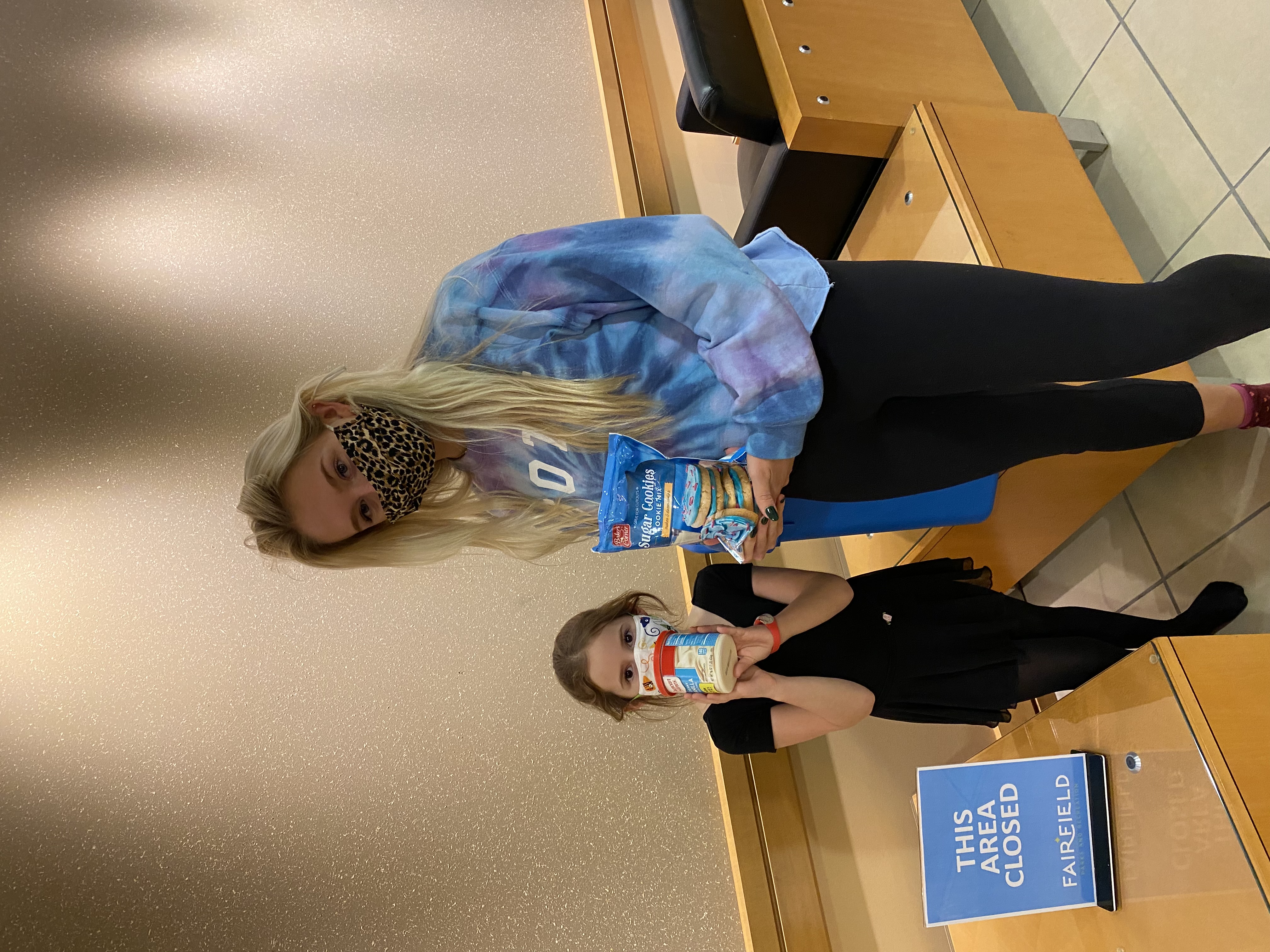 Mother and daughter donating sugar cookies and frosting 2016